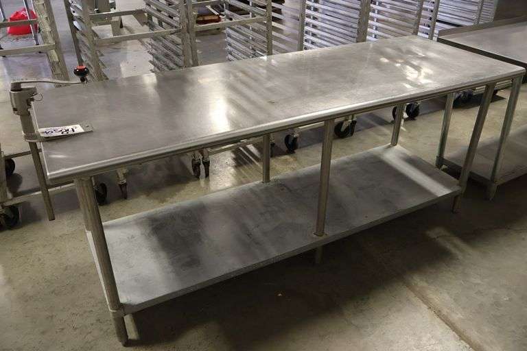 30" x 84" Stainless table with galvanized under shelf and Cozzini can opener