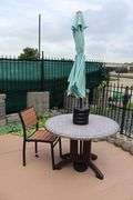 42" round patio table with 1 chairs with umbrella