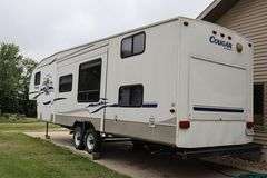 2005 Keystone RV Co. Cougar 8' x 34' fifth wheel pull behind camper with slide out side - good tires, electrical hook up, - buyer to view - Vin: 4YDF314205B06896
