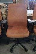 Times 3 - Orange tweed patterned armed office chairs