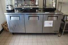 True TUC-72 stainless refrigerated 3 door under counter cooler with stainless work top