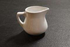 All to go - 3 1/2 oz Acopa creamer bells - 49 total
