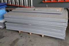 Pallet of 2.5" thick grey gym wall padding - 96" tall with a door pad