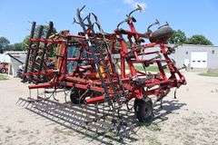 Case-IH 4800FLCU - 27' Vibra Shank Field cultivator w/ Kent 3 bar spike harrow, 7" spacings, walking tandems, sweeps showing wear, s/nJAG0061221