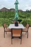 Patio set - 36" x 36" patio table with 4 chairs and umbrella and weights