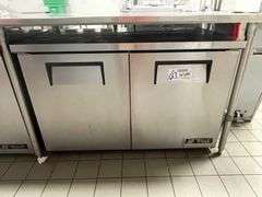 True TUC-48-LP portable 2 door under counter cooler with stainless work top