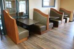 Times 3 - solid oak framed 4 passenger booth openings with vinyl padded backs and seats with single pedestal tables