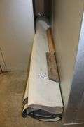 Huge rolled up former bank rug - unknown size