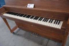 Baldwin 57" wood upright piano with bench