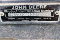 2006 John Deere 2305 riding lawn tractor with 200CX loader, 60" mower deck, & back 3 point - 978 hours, some damage to front - runs goods