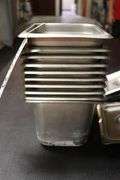 Times 10 - 1/6 x 6 stainless insets with 9 lids