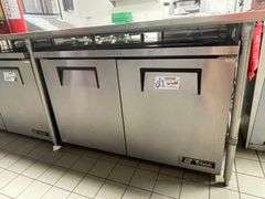 True TUC-48-LP portable 2 door under counter cooler with stainless work top