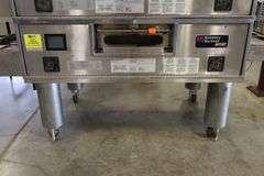 Stack of Middleby Marshall WOW PS670G portable gas conveyor pizza ovens with digital controls & 32" wide conveyors
