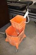 Orange mop bucket