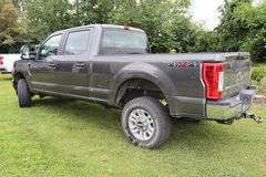 2019 Ford F250 Super Duty 4X4 crew cab gas 8 cylinder pick up truck with 5th wheel mount & plate - 99,329 miles - Needs tires - Some hail damage to hood & sides - Vin:1FT7W2B6XKEE83254