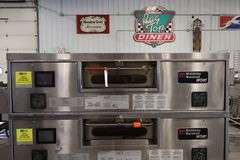 Stack of Middleby Marshall WOW PS670G portable gas conveyor pizza ovens with digital controls & 32" wide conveyors