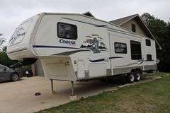 2005 Keystone RV Co. Cougar 8' x 34' fifth wheel pull behind camper with slide out side - good tires, electrical hook up, - buyer to view - Vin: 4YDF314205B06896