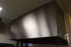 Accurex 54" x 72" stainless baking hood with exhaust fan - has manufacture tag - buyer to remove exhaust fan from roof - seller with cap the hole