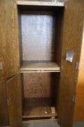 28" wide x 82" tall x 25" deep wood 4 door cabinet