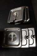 Times 10 - 1/6 x 6 stainless insets with 9 lids