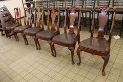 Times 6 - ornate dining room chairs with black vinyl padded seats