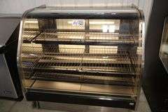 50" Barker curved glass front sliding rear glass door dry pastry case