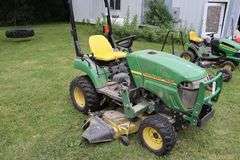2006 John Deere 2305 riding lawn tractor with 200CX loader, 60" mower deck, & back 3 point - 978 hours, some damage to front - runs goods