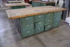 45" x 96" x 2" Thick shop table with 24 bay locker metal base cabinet
