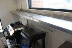12" x 120" stainless wall shelf by Sherman