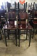 Times 12 - Black metal framed cherry finished wood seat & back bar chairs - wood has some knicks around corners