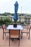 Patio set - 36" x 36" patio table with 4 chairs and umbrella and weights
