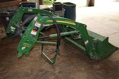 2006 John Deere 2305 riding lawn tractor with 200CX loader, 60" mower deck, & back 3 point - 978 hours, some damage to front - runs goods