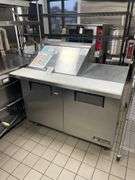 True TSSU-48-12M-8 portable 48" refrigerated prep table - 2 door - 1 lid with work space