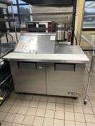 True TSSU-48-12M-8 portable 48" refrigerated prep table - 2 door - 1 lid with work space