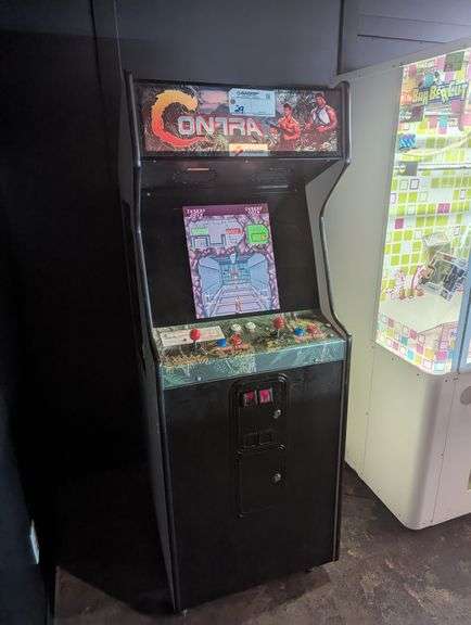 Konami Contra coin operated arcade game - no model or serial - set up for 984 tokens