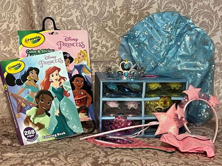 Treat your aspiring Little Miss National Cattle Congress and future National Cattle Congress Queen to this fun princess package! The set includes a set of pink, blue and yellow crowns, shoes, skirts and costume jewelry; pink purse; pink star headband and wand; pink and green princess mirror; Disney princess coloring book; and Disney princess color and sticker activity packet. She will spend hours playing with these royal goodies!