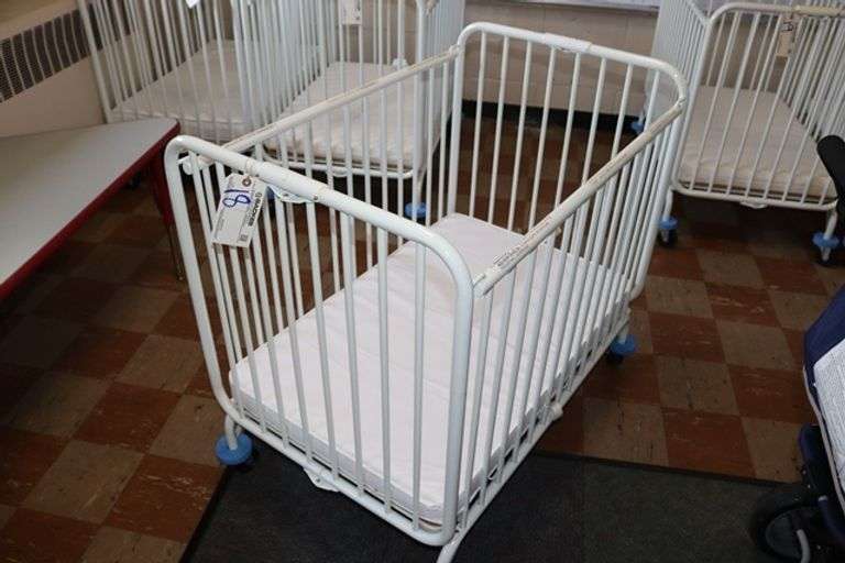 L.A. Baby white metal 2' x 3' portable baby crib with mattress