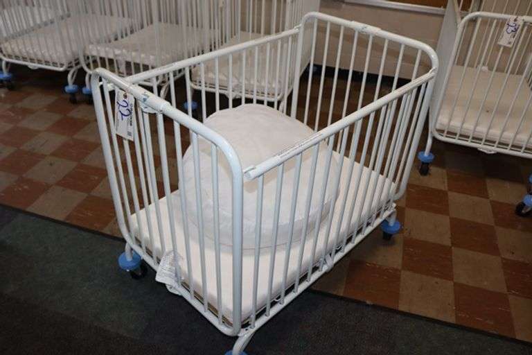 L.A. Baby white metal 2' x 3' portable baby crib with mattress