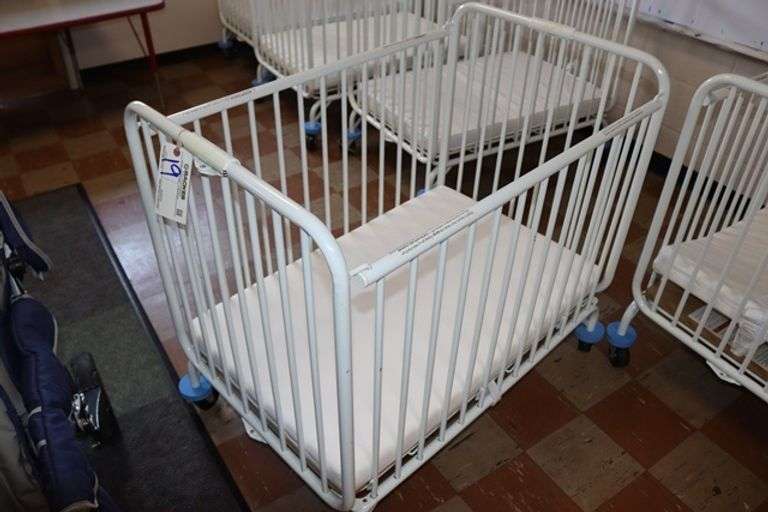 L.A. Baby white metal 2' x 3' portable baby crib with mattress