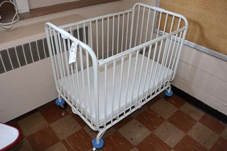 L.A. Baby white metal 2' x 3' portable baby crib with mattress