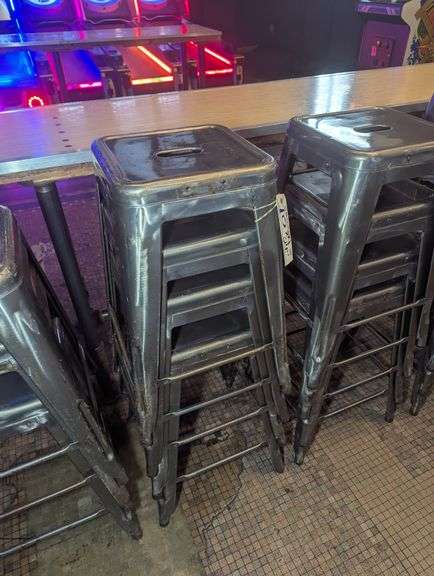 Times 4 - 24" tall silver metal bistro style stools - showing some rust - buyer to view