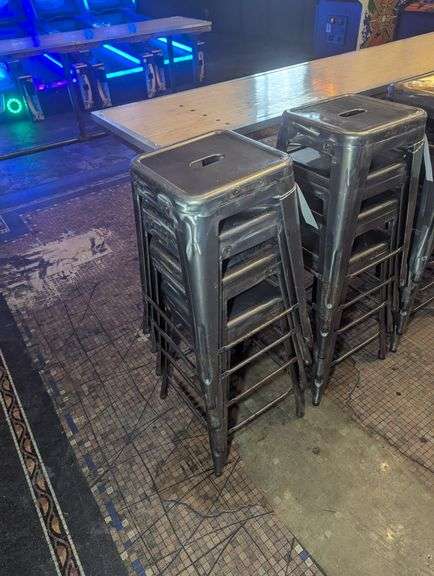 Times 4 - 24" tall silver metal bistro style stools - showing some rust - buyer to view