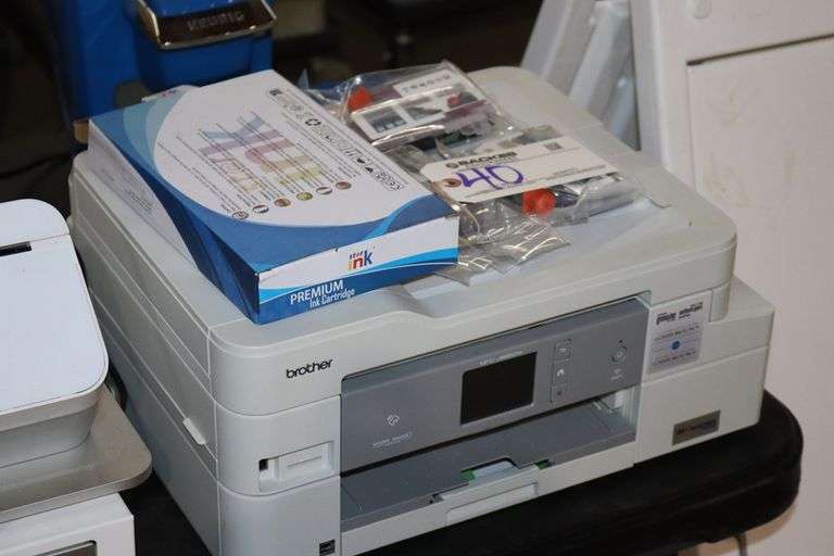 Brother MFC-J995DW printer with some ink cartridges