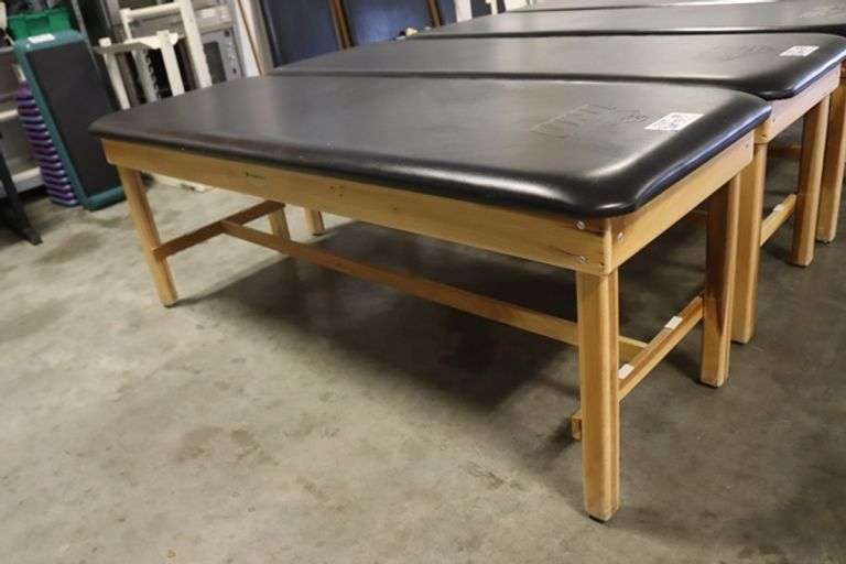 Dynatronics 30" x 84" x 30" tall wood framed black vinyl exam/rehab table - stamped UNI in top vinyl