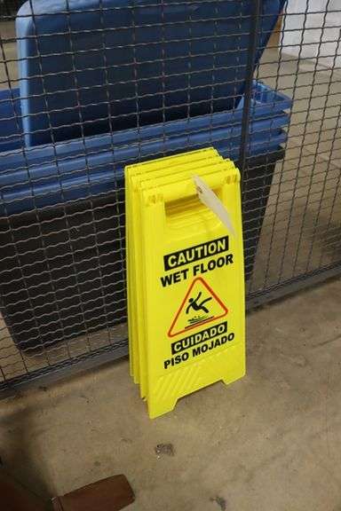 Times 4 - Caution wet floor signs