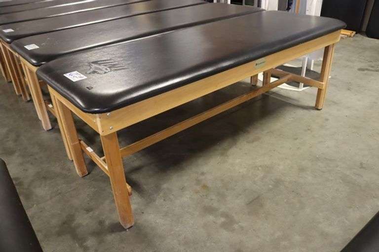 Dynatronics 30" x 84" x 30" tall wood framed black vinyl exam/rehab table - stamped UNI in top vinyl