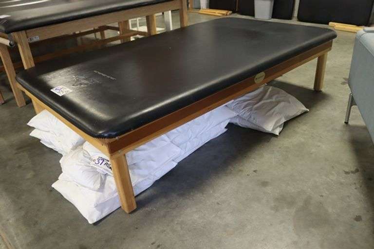 Dynatronics 48" x 84" x 20" tall wood framed black vinyl exam/rehab table - stamped UNI in top vinyl