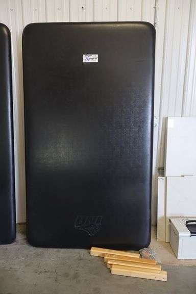 Dynatronics 48" x 84" x 20" tall wood framed black vinyl exam/rehab table - stamped UNI in top vinyl