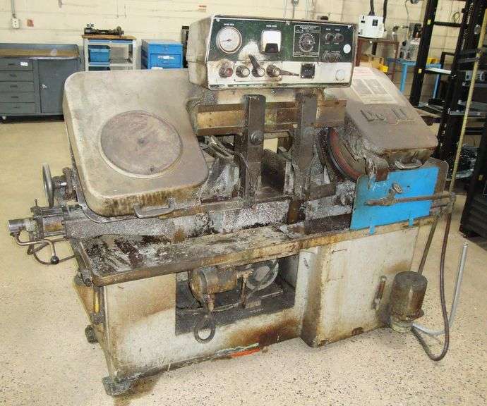 Do All Horizontal Band Saw with outfeed table, footprint approx. 80" x 96" x 63" tall and table approx. 84" x 21" x 34" tall Note-A loading charge of $150 will be added to final bid price
