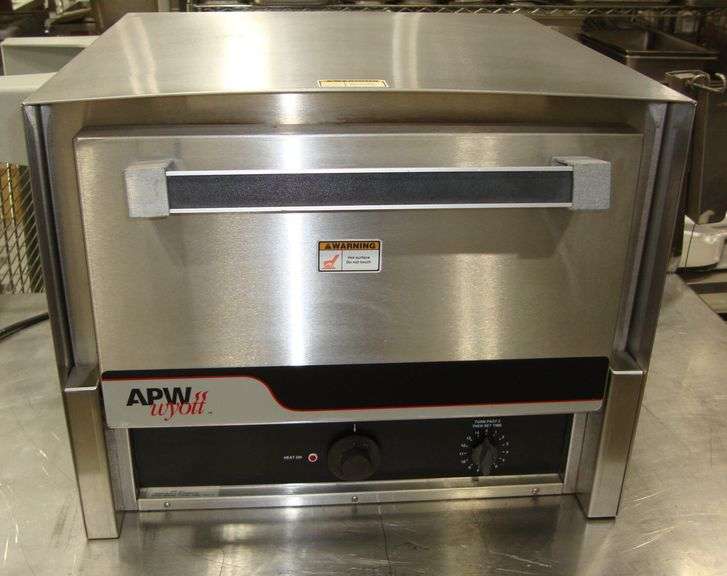 APW Wyott Electric Countertop Pizza Oven, Model CDO-17, NSF, approx. 22" x 22" x 18" tall, 120V   Note-Pictures show missing interior stones as they were misplaced during moving equipment, so we will either have the original ones or have new stones for removal day